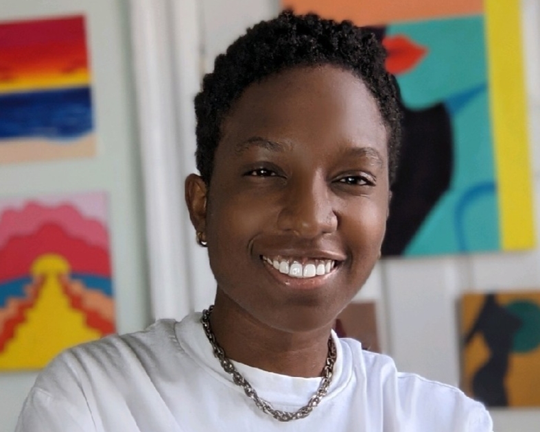 a woman with short hair and a white shirt