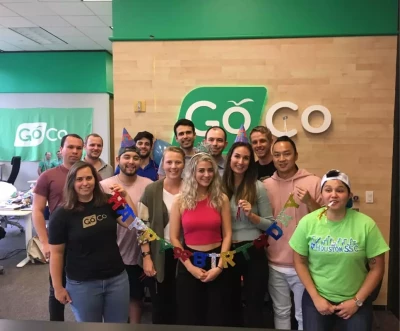 a group of people posing for a photo