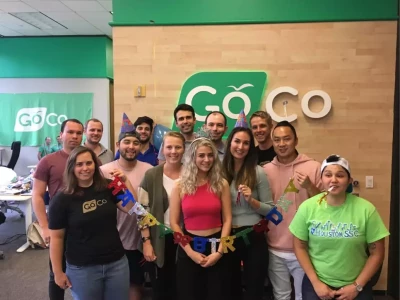 a group of people posing for a photo