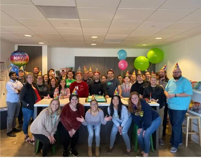 a group of people posing for a photo
