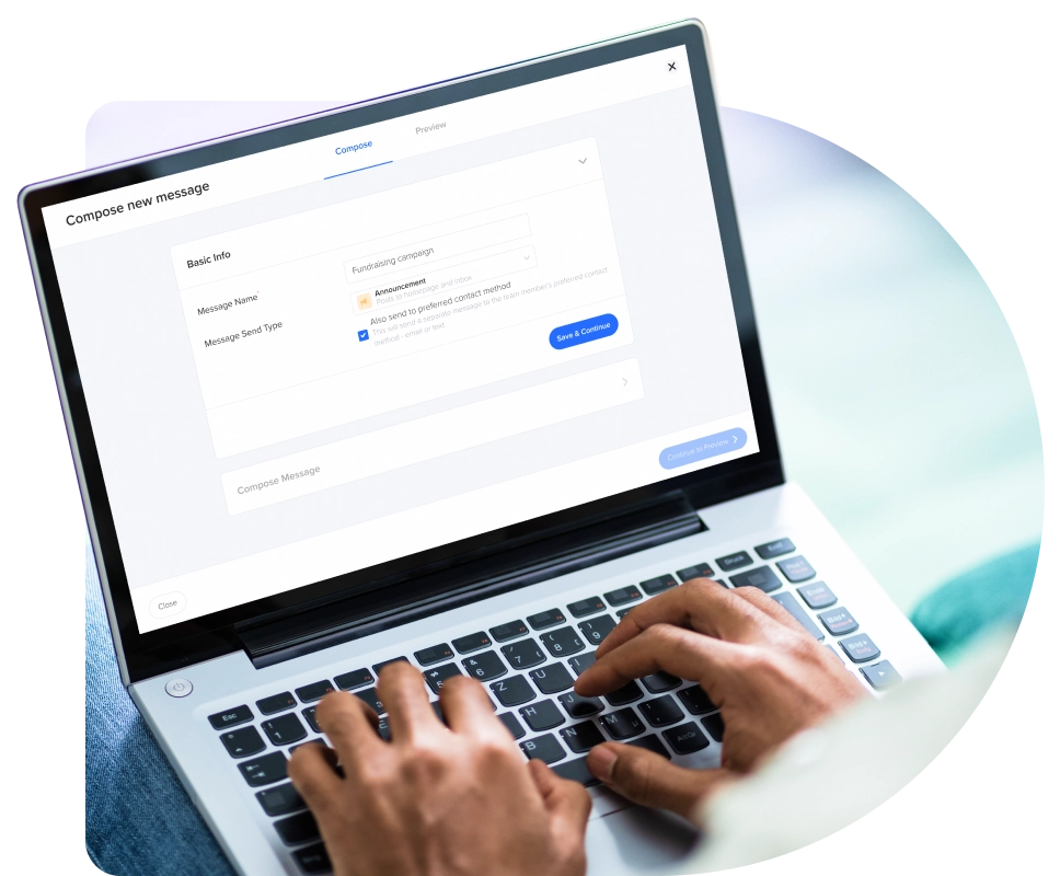 a person using a laptop with a log on the screen