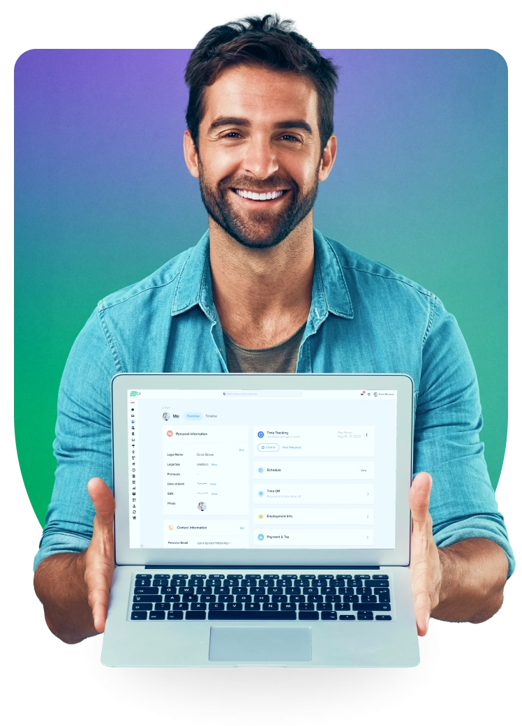 a man holding a laptop with a facebook page on it