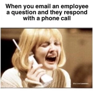 a woman laughing and holding a cigarette