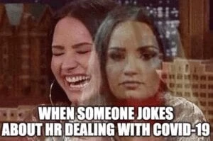 a woman laughing and a man laughing with the capt