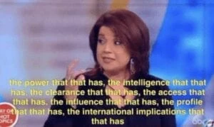 a woman in a black dress is talking to a man