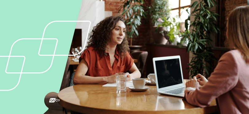an employee and her manager talking during an informal stay interview