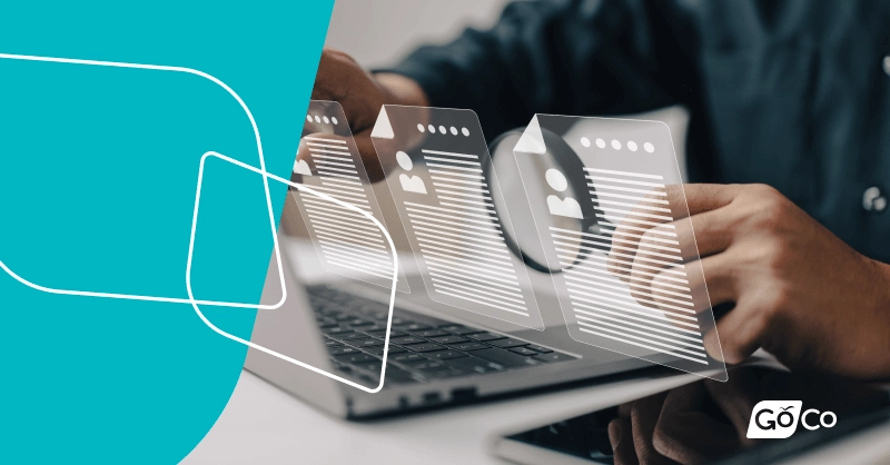 a man using a laptop with a screen showing a video