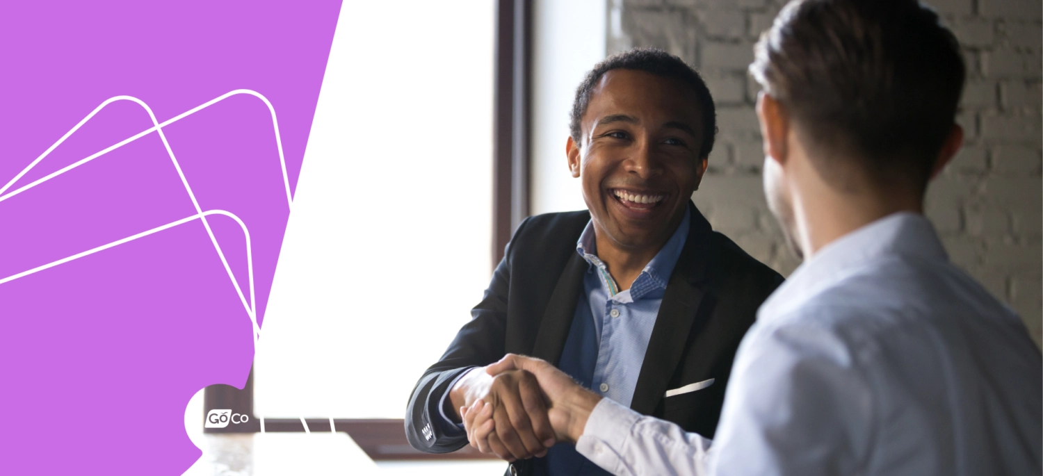 an employer shaking the hand of an exiting employee