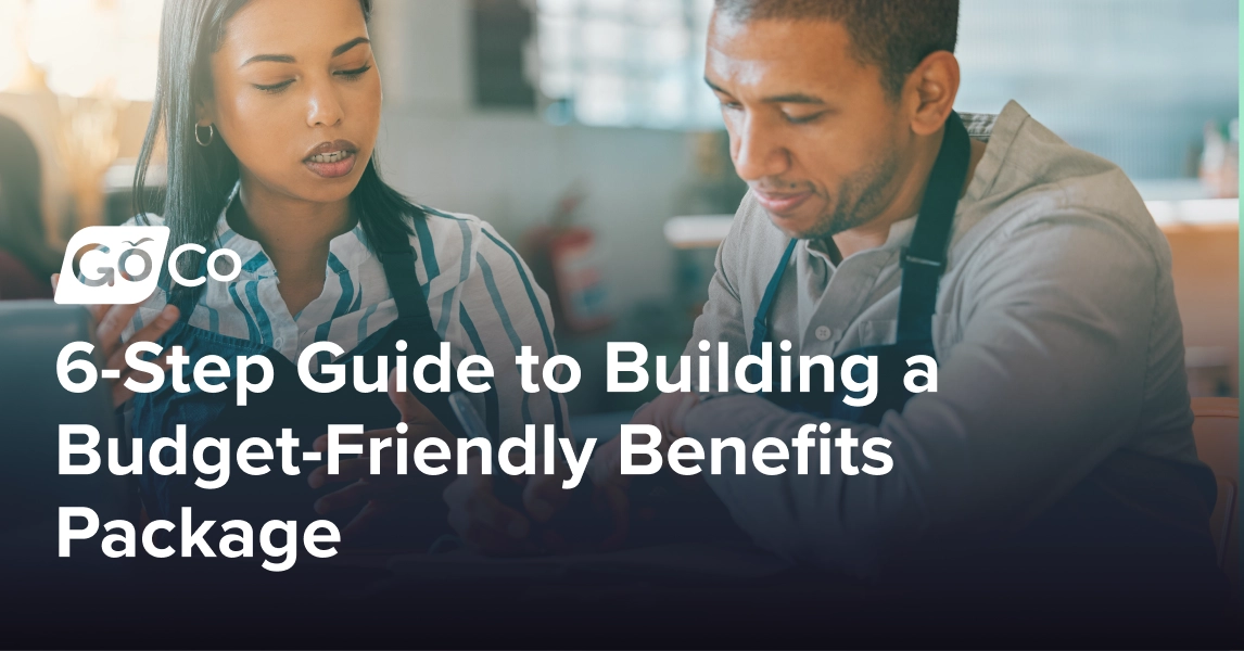 Two small business owners discussing and planning budget and expenses in the cafe or coffee shop.