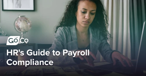 A Woman in Plaid Blazer Using Her Laptop and Mobile Phone