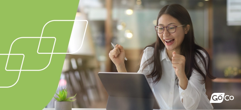 an employee participating in some virtual fall team building activities with her coworkers