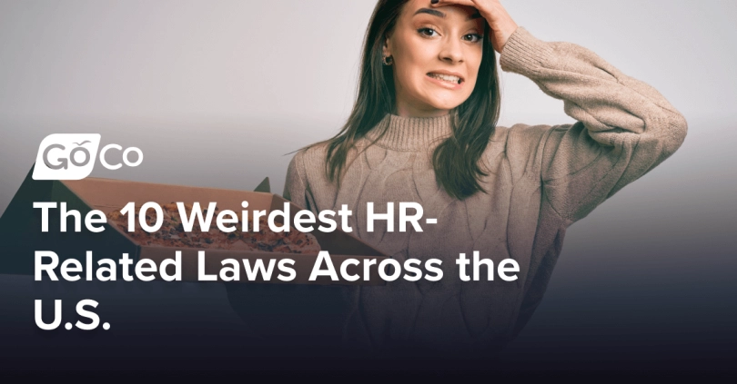 A young woman looking stressed and upset holding a pizza in a pizza box.