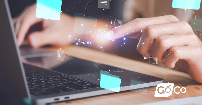a person using a laptop with a cloud over it