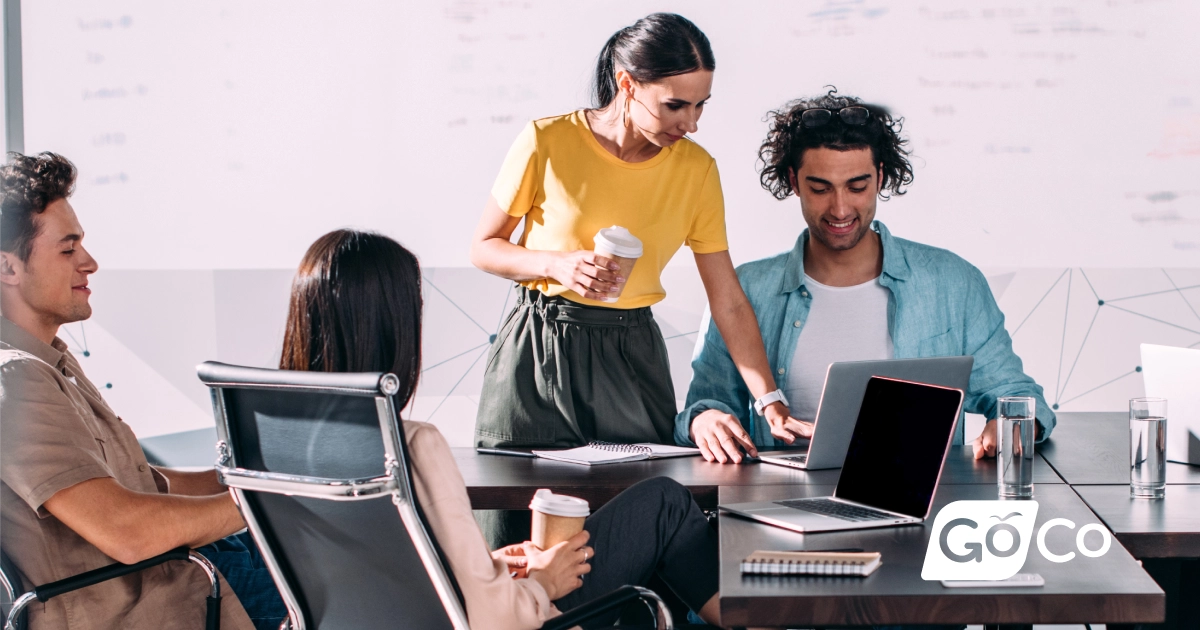 a group of people sitting around a table
